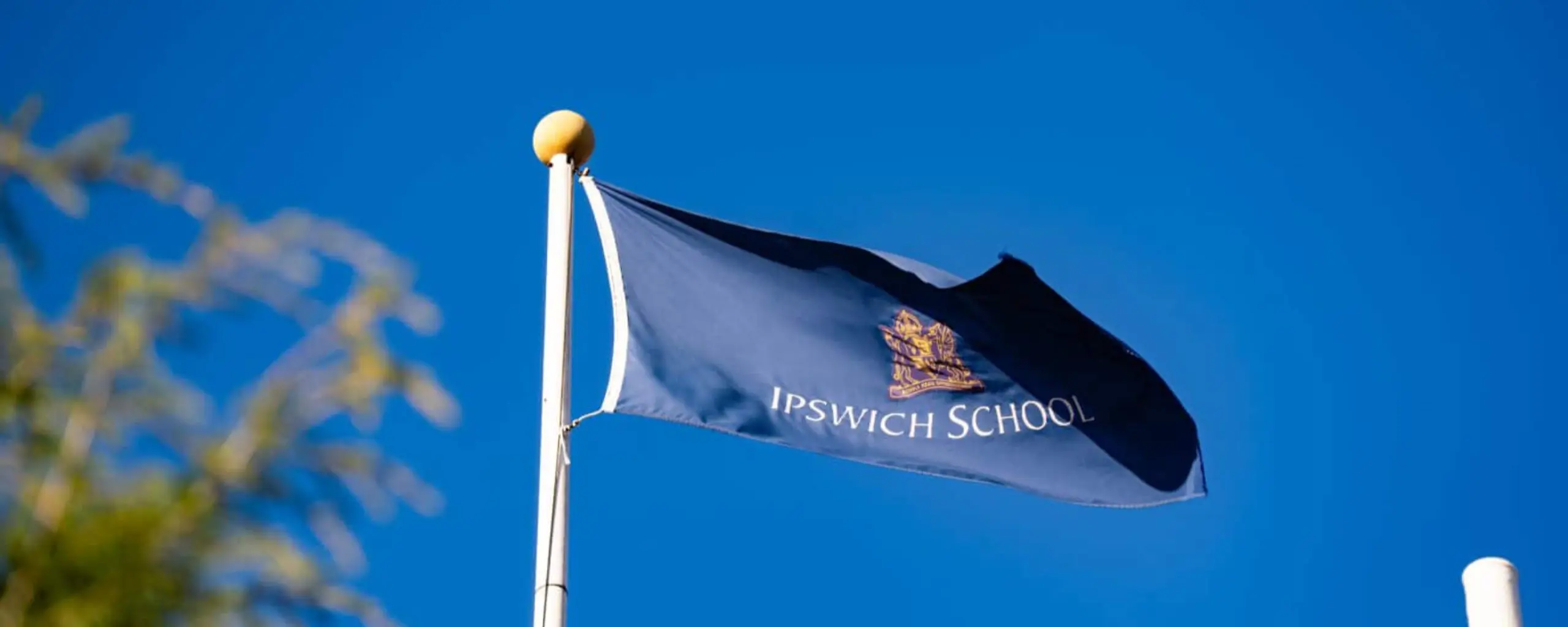 Ipswich School flag on a sunny day.