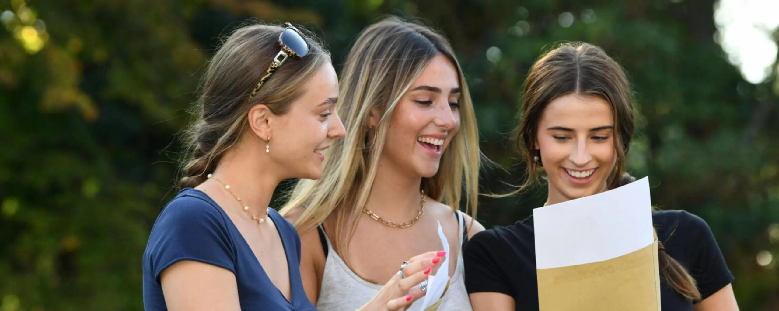 Ipswich School pupils opening their results on A Level results day.