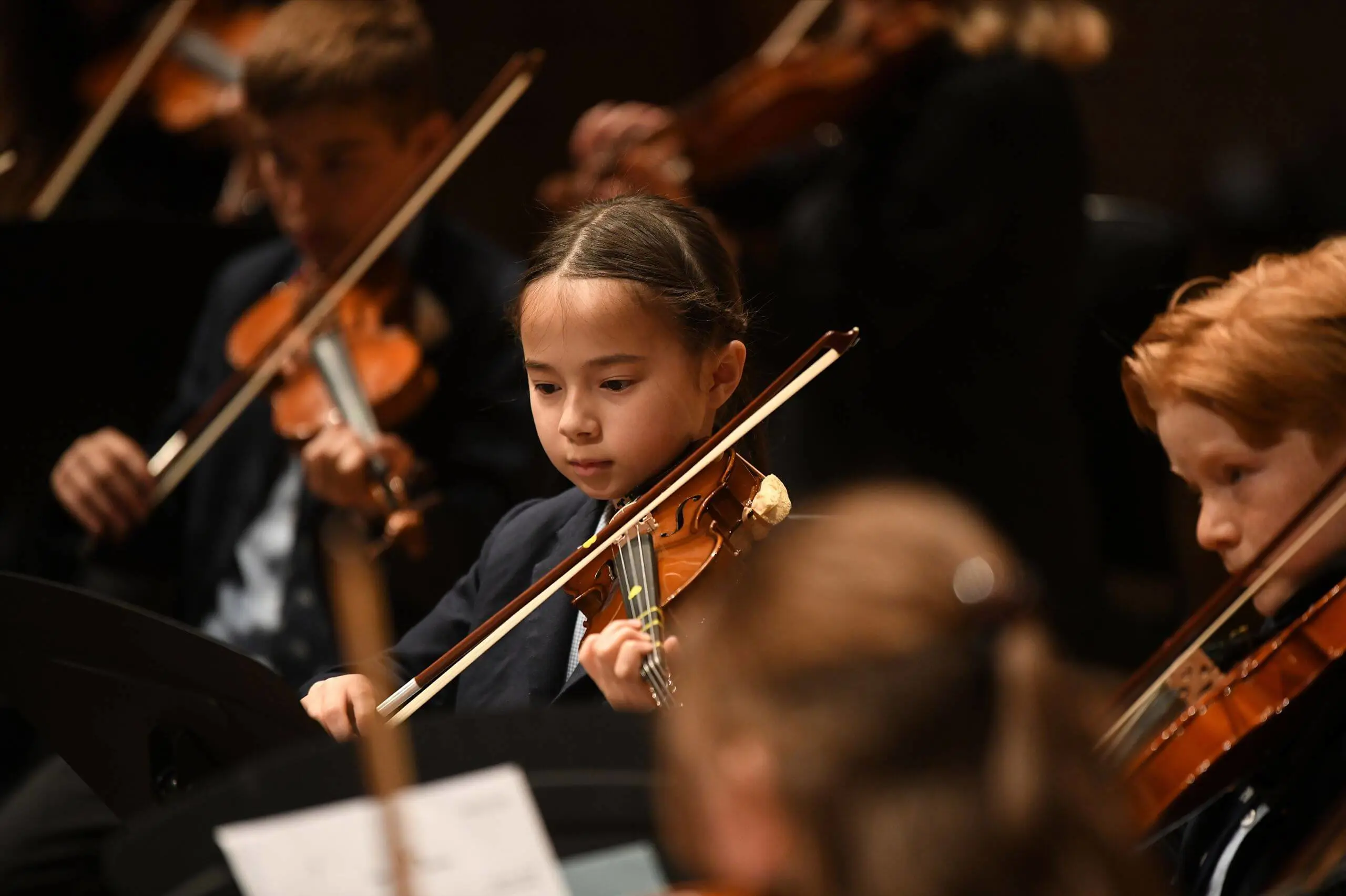 Ipswich School Prep pupil playing the violin at the Snape Concert Rehearsals 2025.