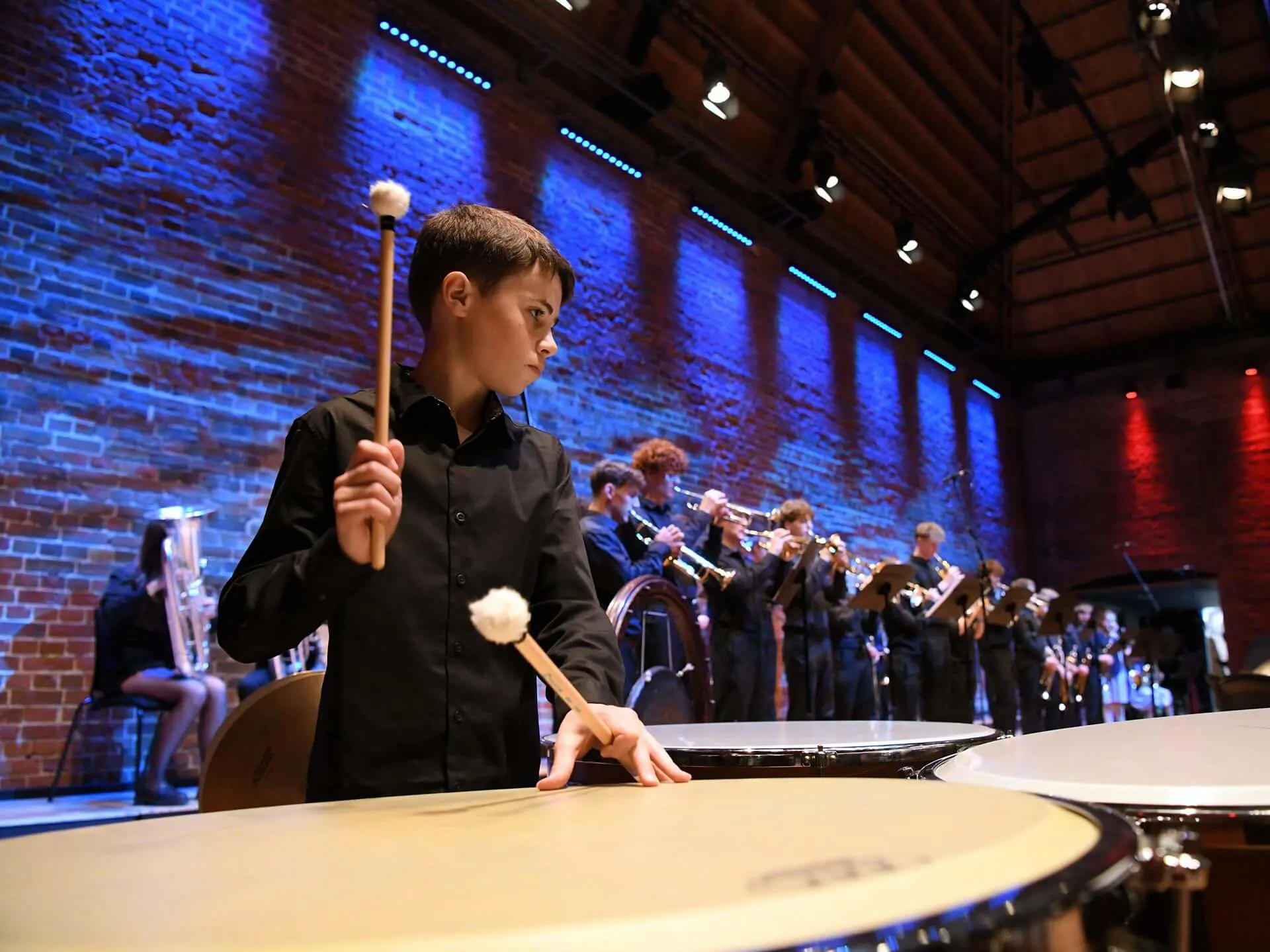 Ipswich School student playing timpani at the Snape Concert rehearsals 2025.