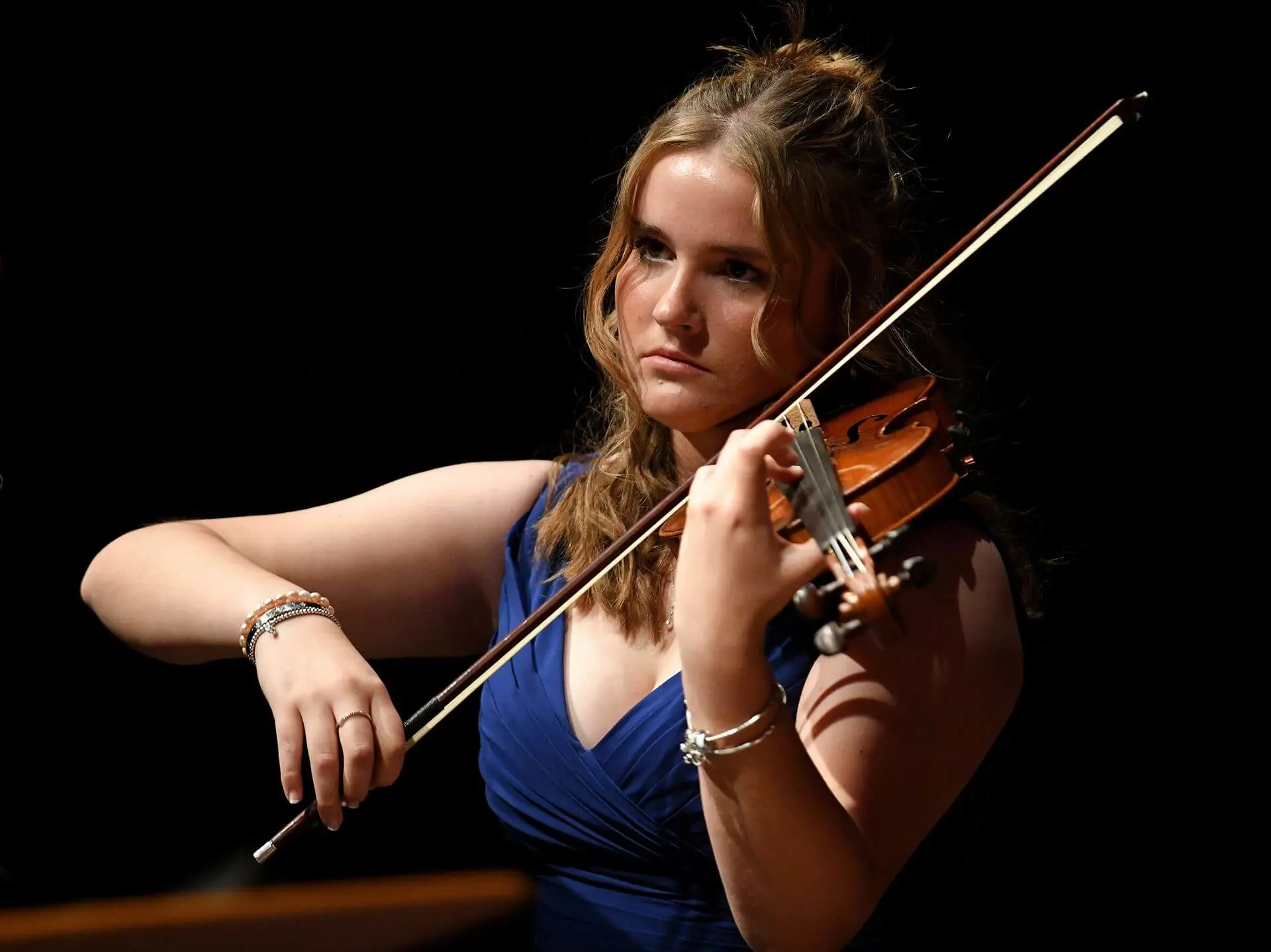 Ipswich School student playing the violin at the Snape Concert rehearsals 2025.