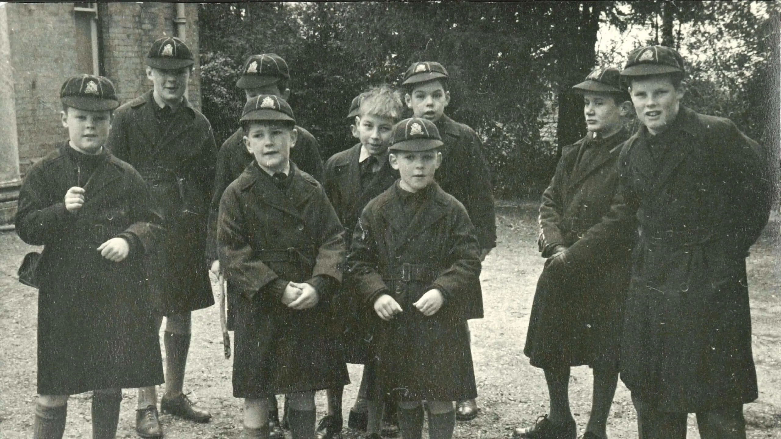 Vintage photograph of Ipswich School pupils outside in winter coats.