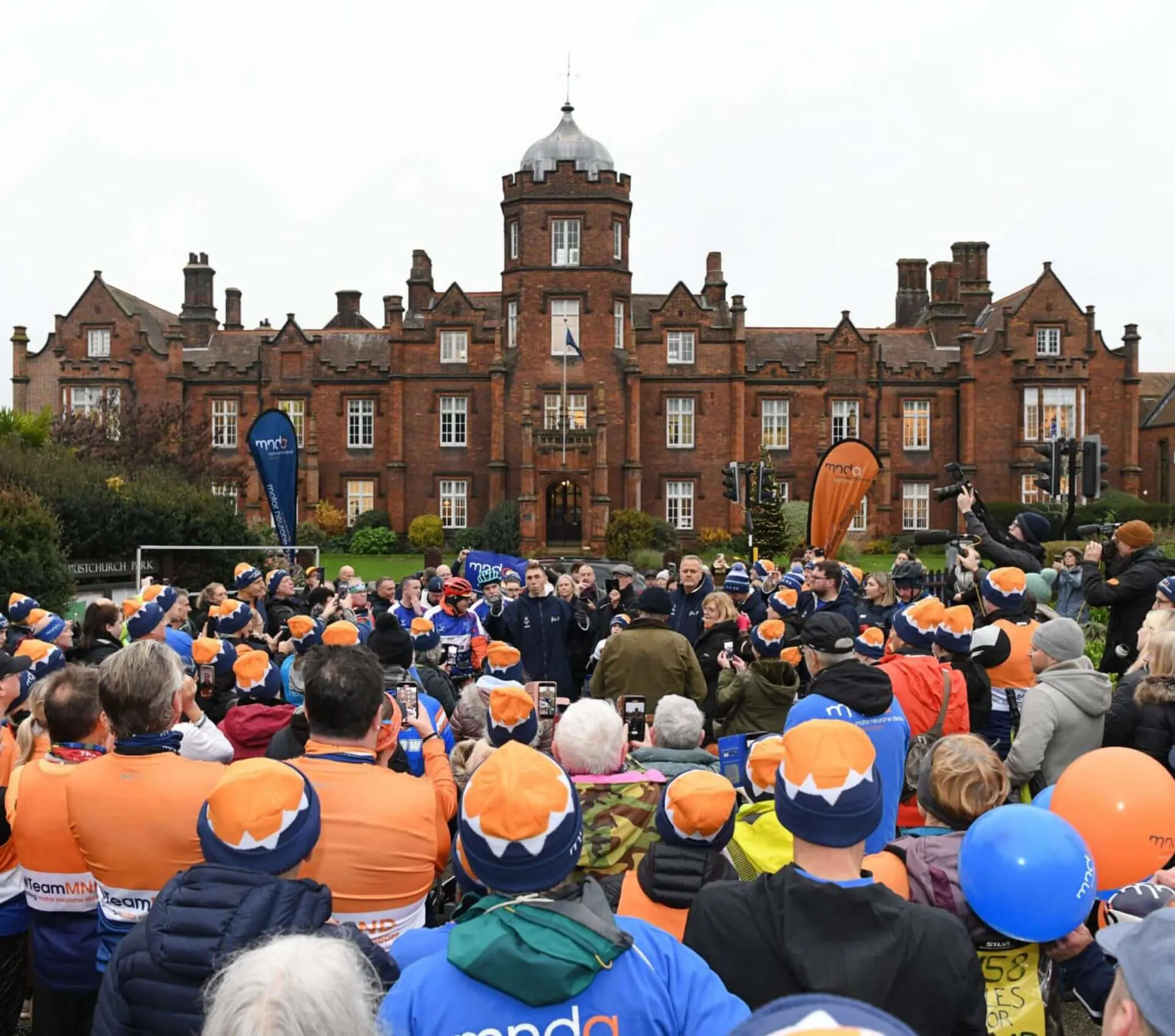 Kevin Sinfield with pupils and staff at Ipswich School.