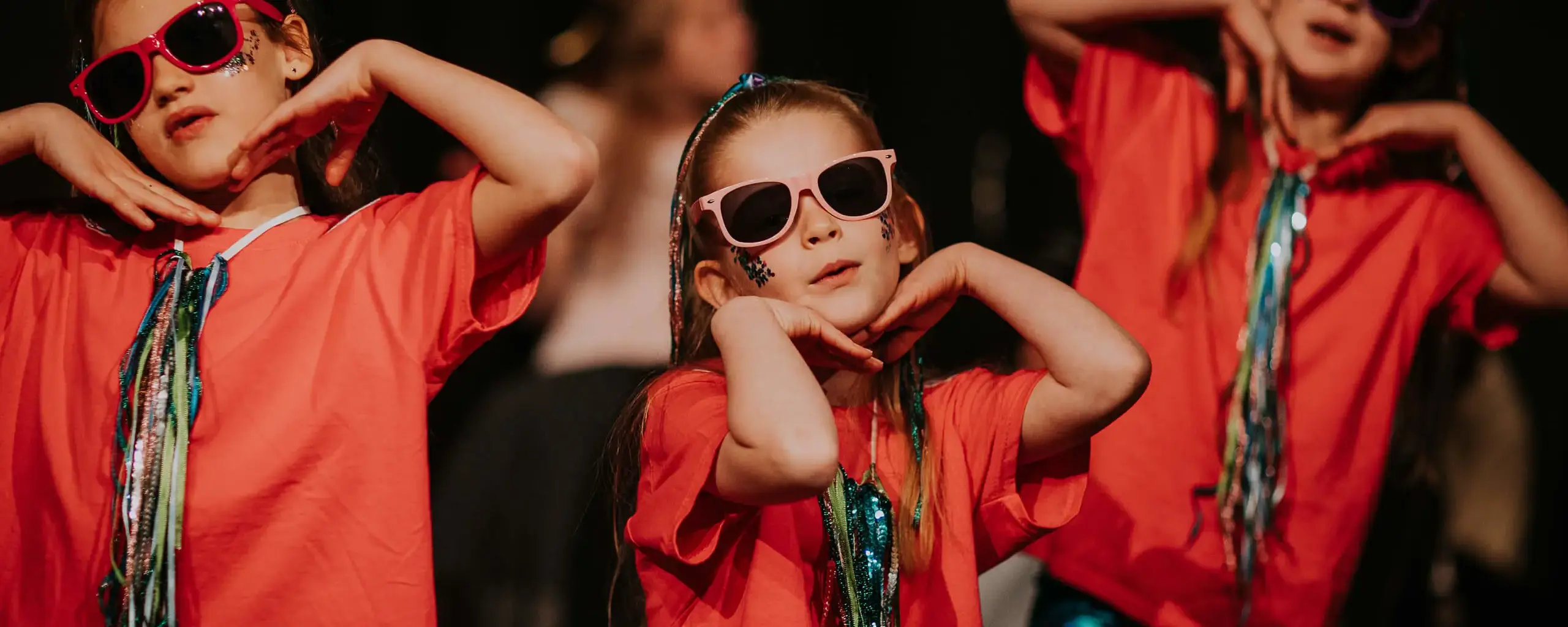 Pupils on stage performing a dance routine at Ipswich School, a private school in Suffolk